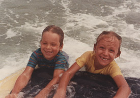 Olympic Mogul Skier and professional photographer Hannah Hardaway as a young girl playing in the ocean with her cousin on the Jersey Shore