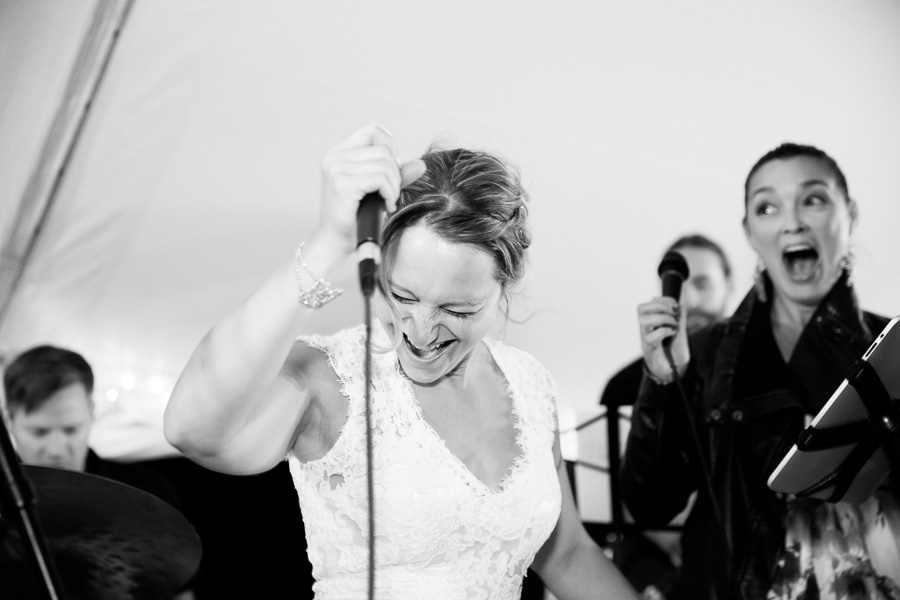 Halfway through her wedding reception, Christina just got up on stage and started belting it out with the band. As you can see by the look on the lead singer's face in the background, I was not the only one who was impressed!